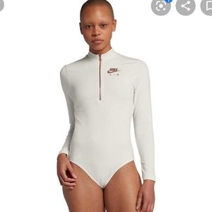 nike rose gold bodysuit